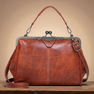 Borsa vintage con chiusura a scatto
